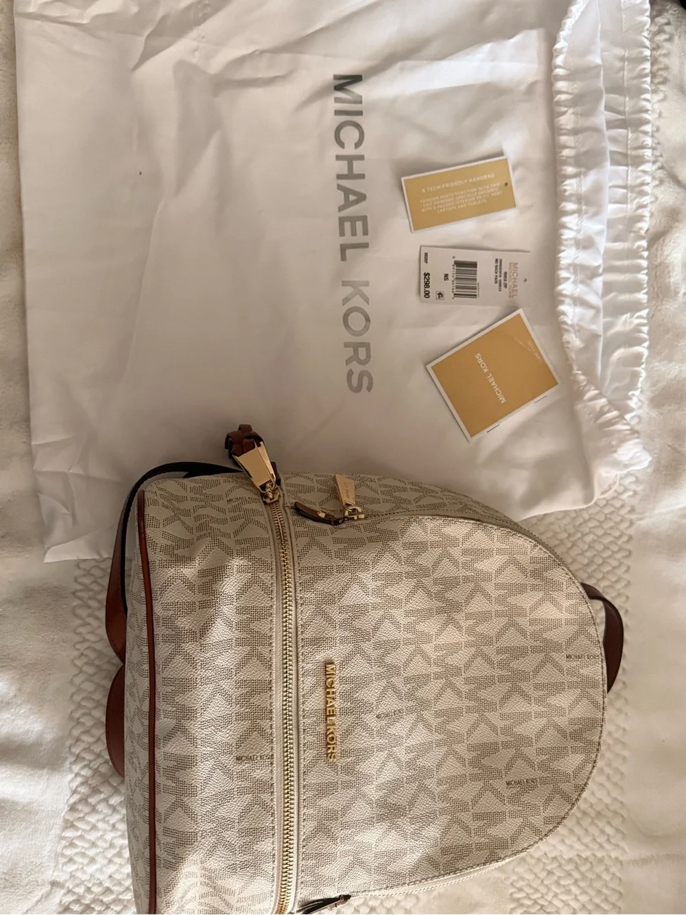 Michael Kors Cream Signature MK Pattern Backpack with Gold Hardware